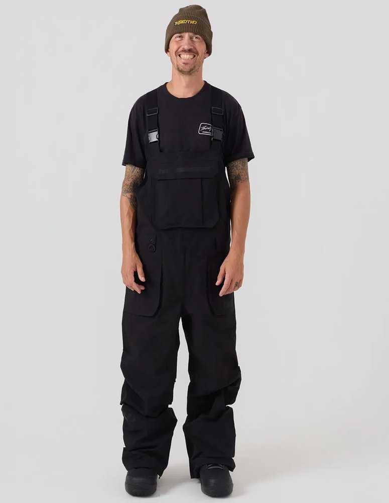 ThirtyTwo Basement Bib snowboard bib in black, worn front view