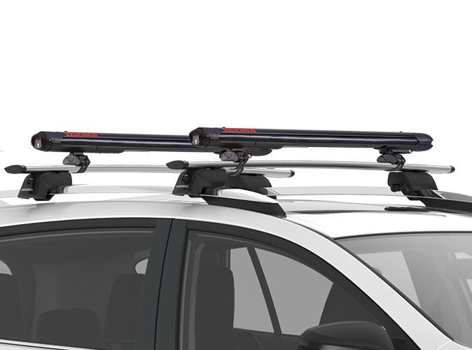 Yakima FatCat EVO 6 ski and snowboard rack mounted on car crossbars